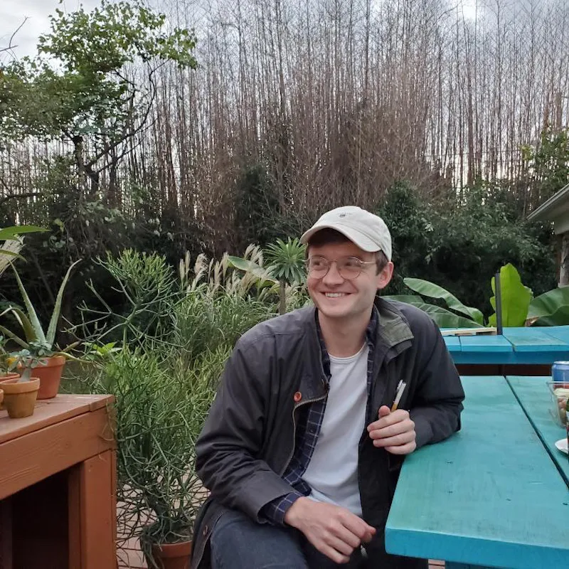 Ben Pearey sat at a bench