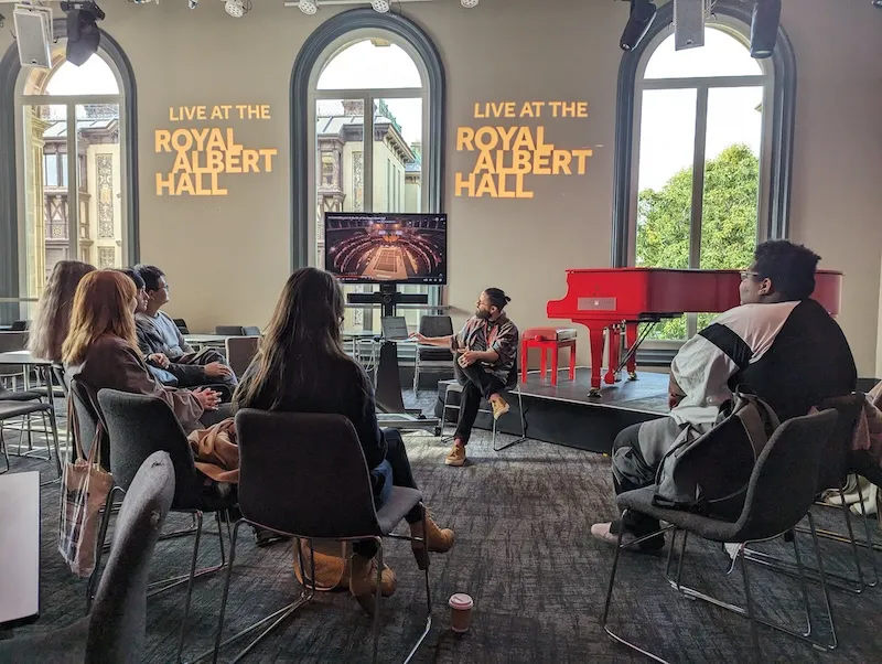 Students watching a presentation at the Royal Albert Hall