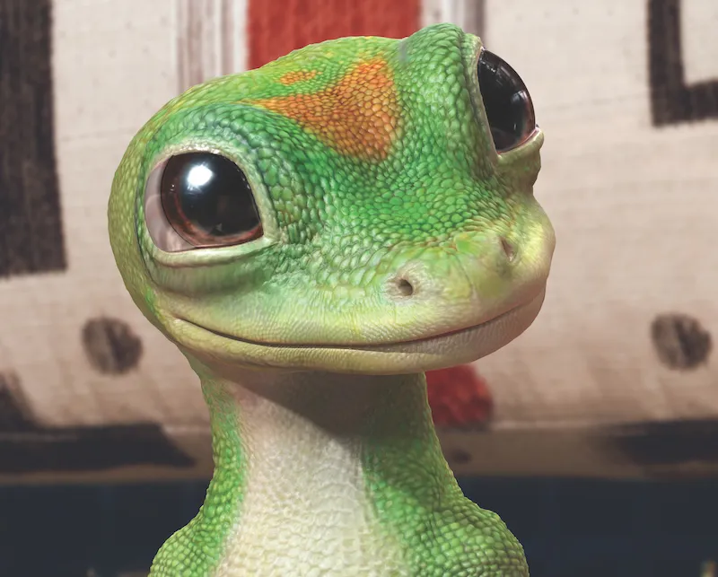 Image shows a close-up of the famous GEICO gecko, designed by UCA alumni David Hulin