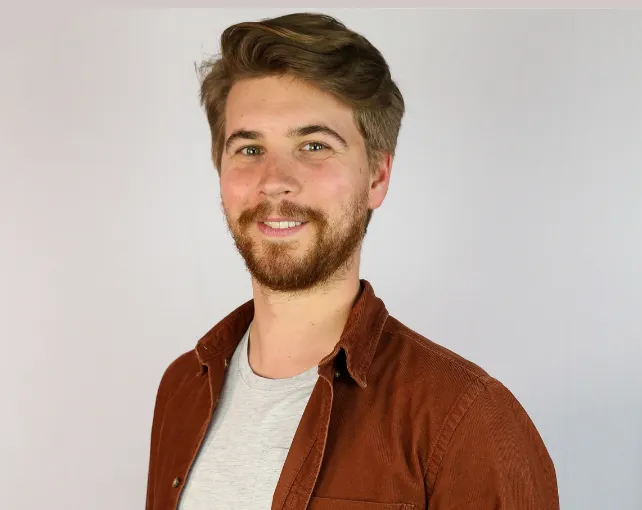 A head and shoulders image of UCA graduate Jordan Parker
