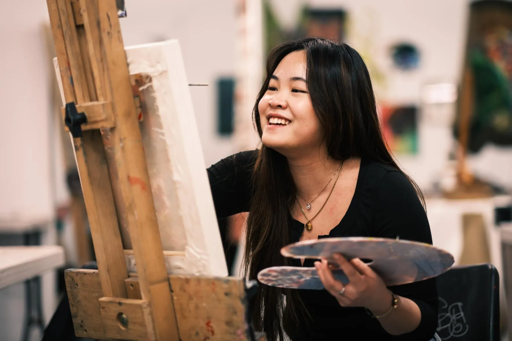 Student working in a fine art studio