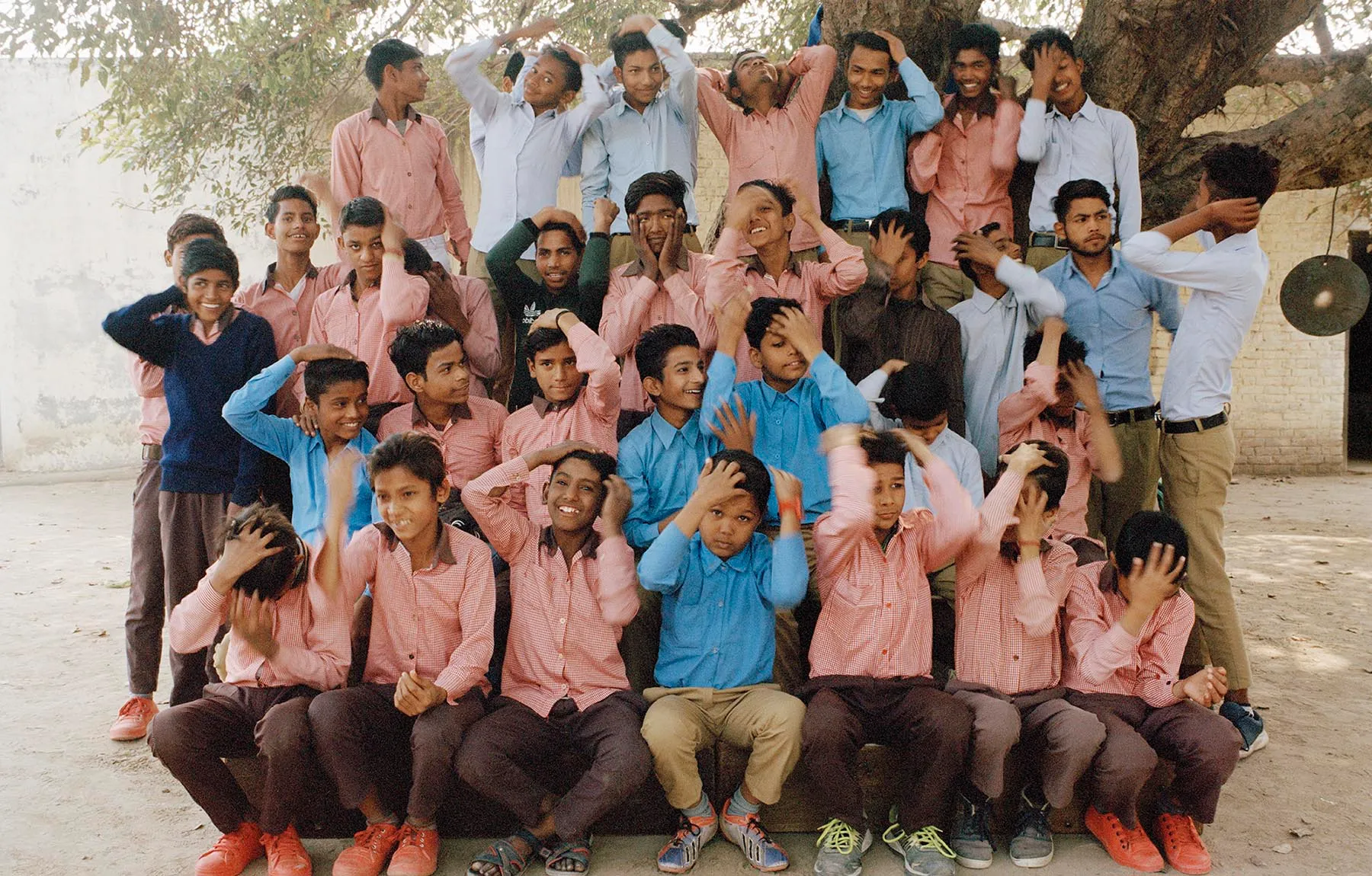 'Boys Tidying Their Hair' by Vikram Kushwah