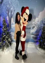 UCA student, Nicole Clachar, posing for a picture with Mickey Mouse