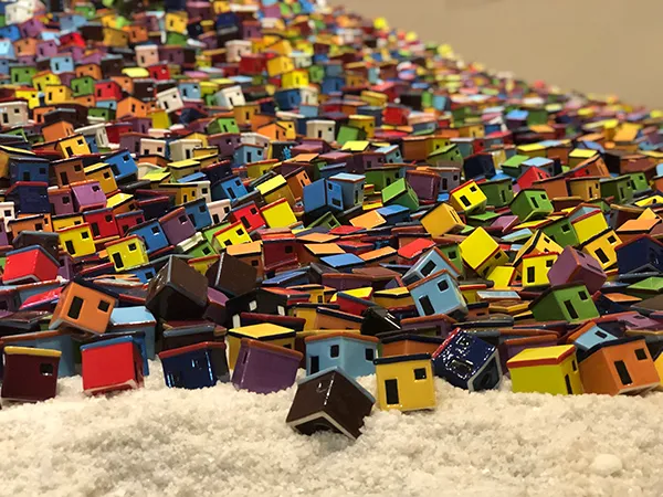 The ceramic houses sit on a bed of salt