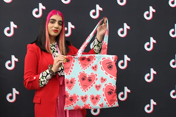 Hally Ahmed with her final print and tote bag