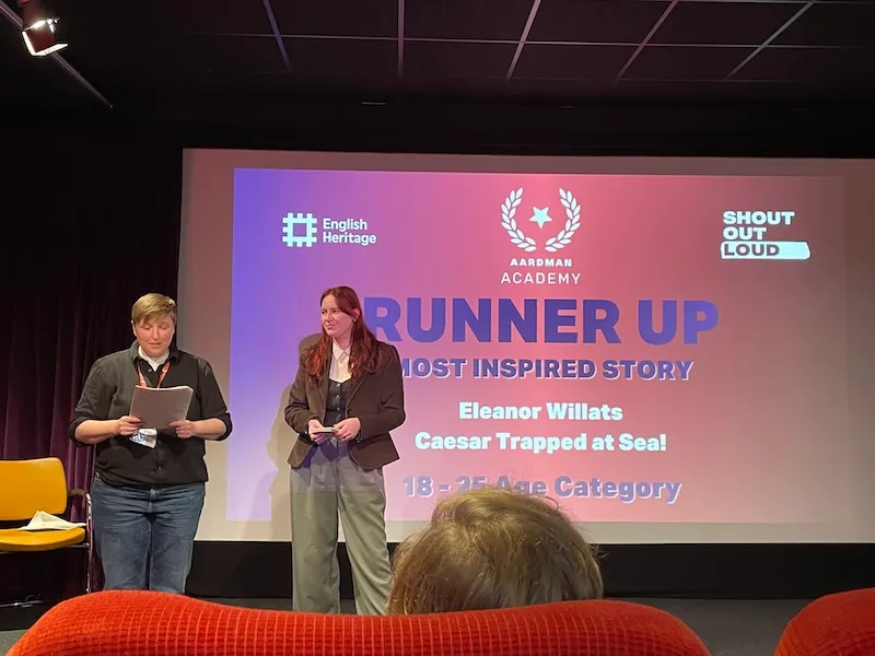 Elly Willats receiving her award at the Animated Histories Film Festival