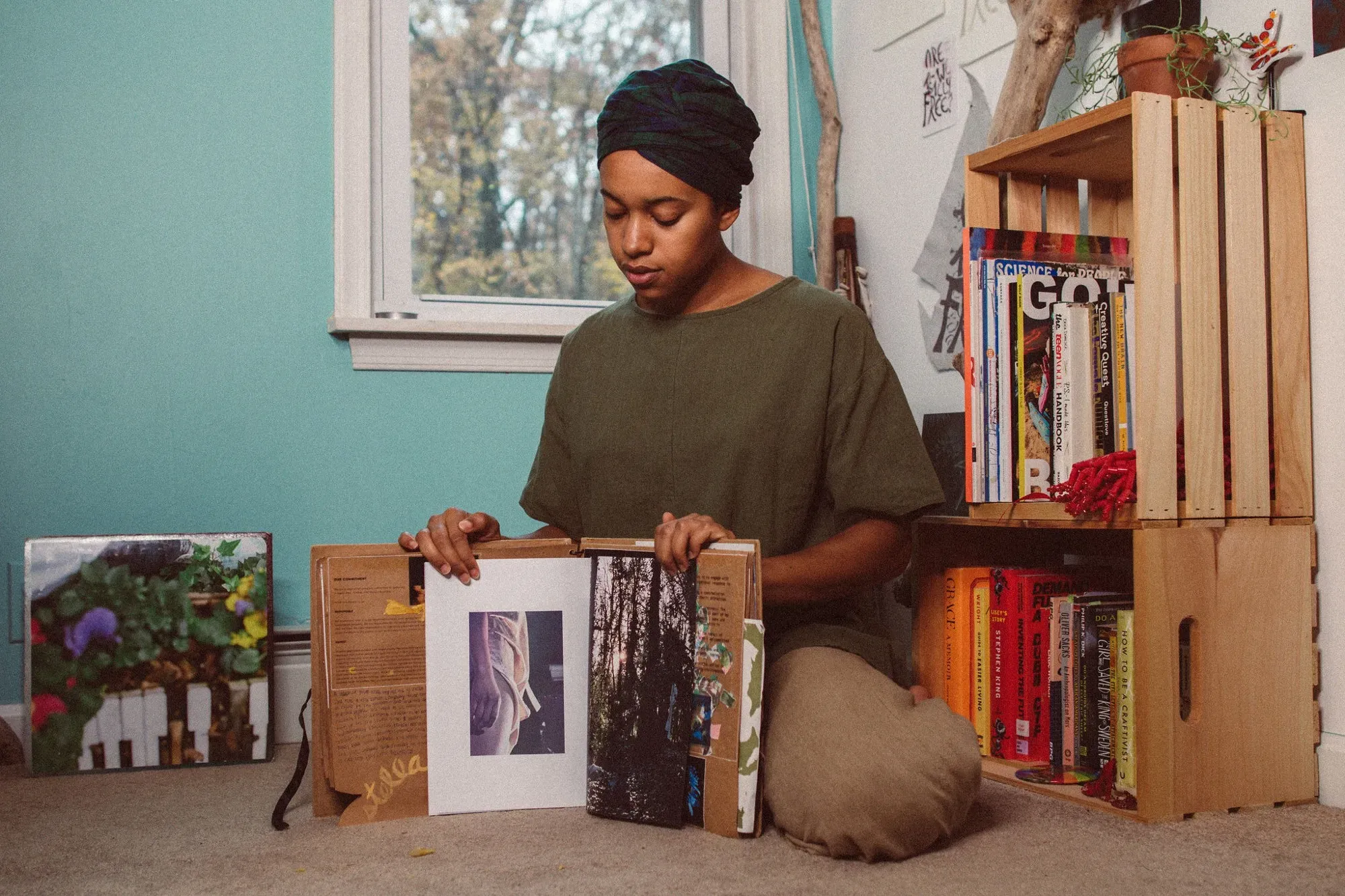 Cassidy Moses showcasing some artwork