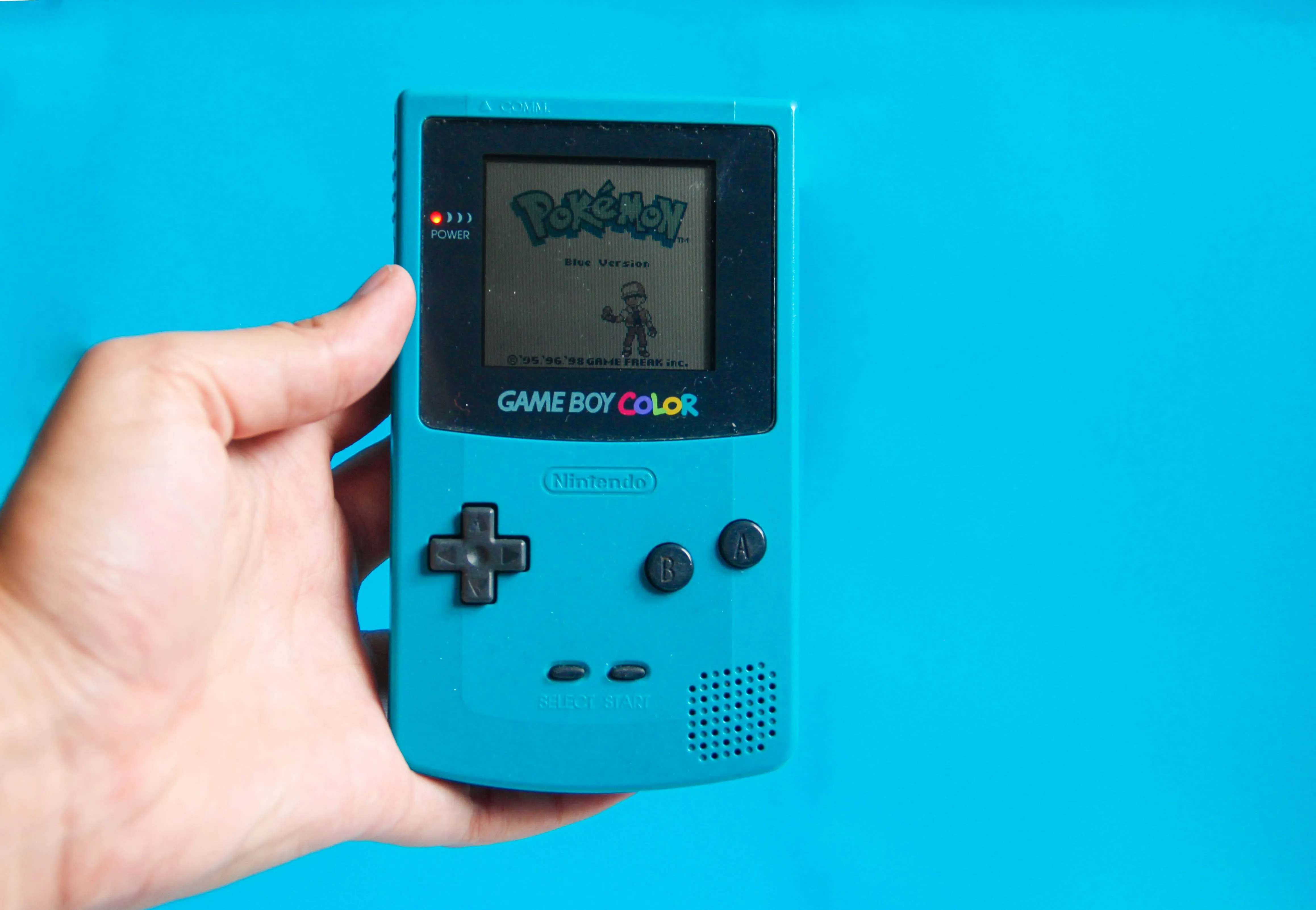 Someone playing Pokemon on Gameboy Colour