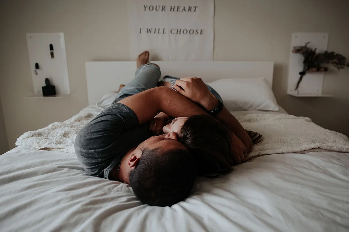 Couple lying on bed