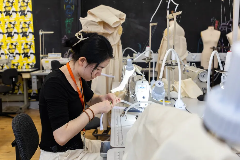 A student working in a fashion studio