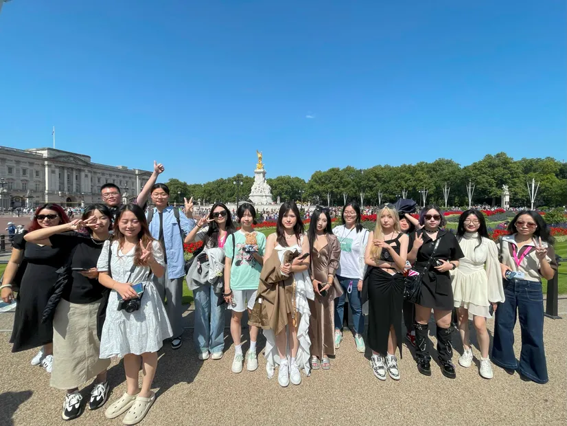 students outside Buckingham palace