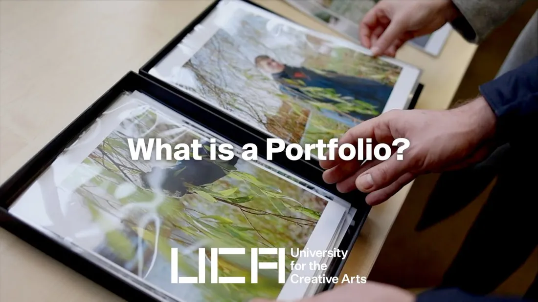 A student reviewing their photography portfolio