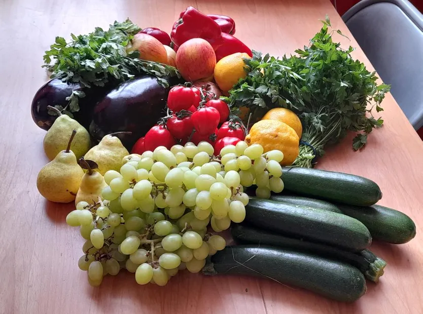 a table covered in fruit and veg
