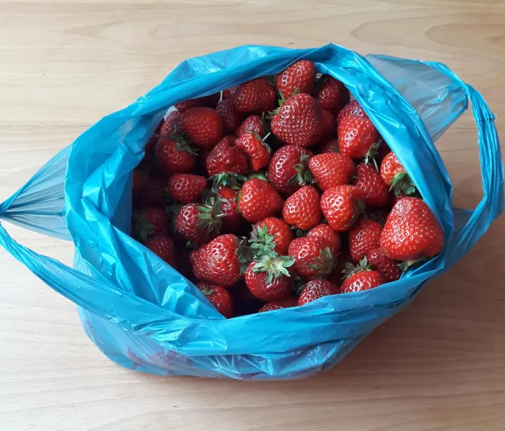 a bag of strawberries