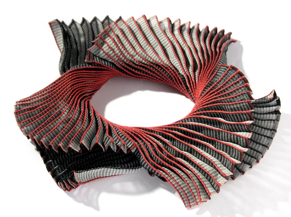 Three-dimensional textile jewellery, ‘Triple Spiral’, silk and steel. Ann Richards, 2008. © Ann Richards / Crafts Study Centre (2012.15.5.4)