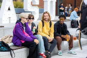 A group of students talking at a Freshers event