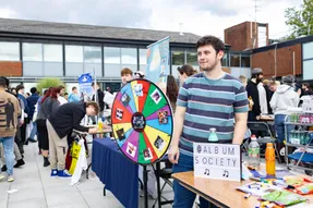 Student running a stall at the Freshers Fair