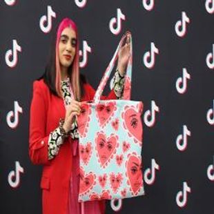 Hally Ahmed with her final print and tote bag