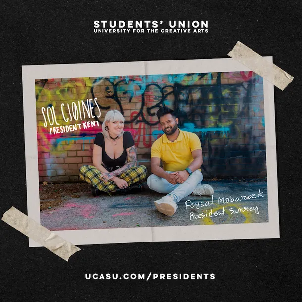Image shows UCASU Presidents Sol Gjoines and Foysal Mobarock sitting together in front of a graffiti covered wall