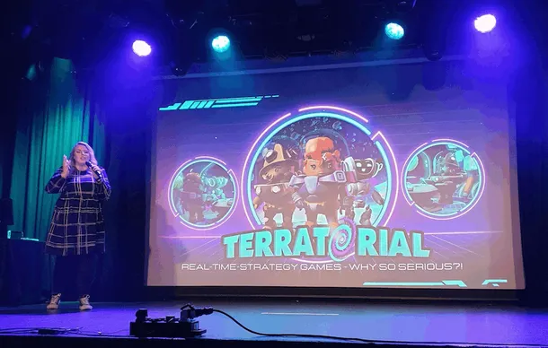 Sally Sheppard speaks on stage at the launch of a game