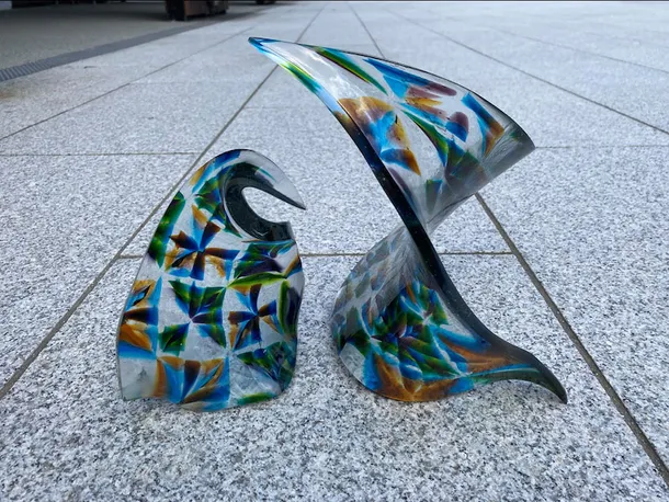 Two pieces of moulded glass art by artist Catherine Dunstan