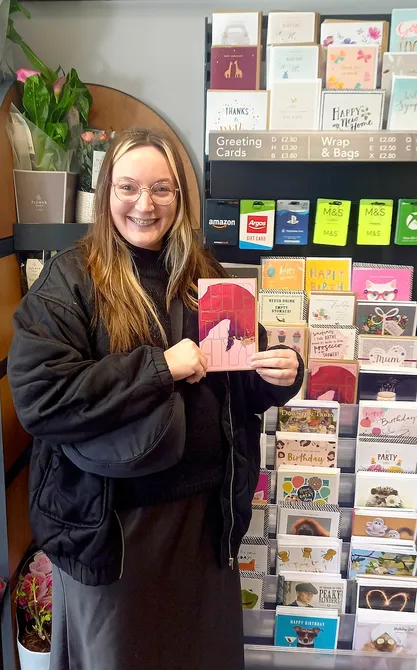 Claire with her card on sale at BP's M&S Simply Food store in Farnham