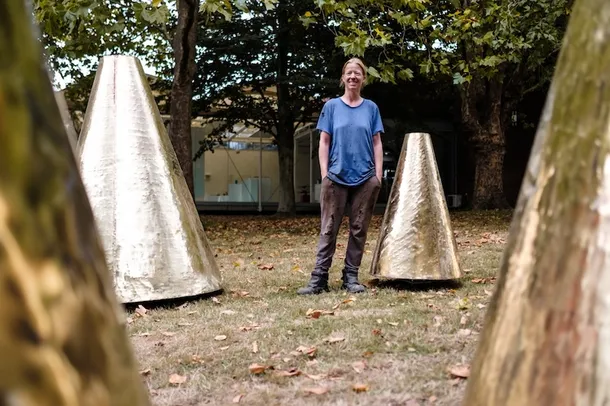 The artist, Natalie Bradwell with 'A Hand's Turn'.