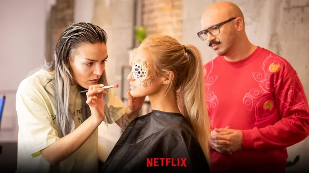 Hannah Cunningham applies her artistic flair to a model during Glow Up! (Picture courtesy of Netflix)