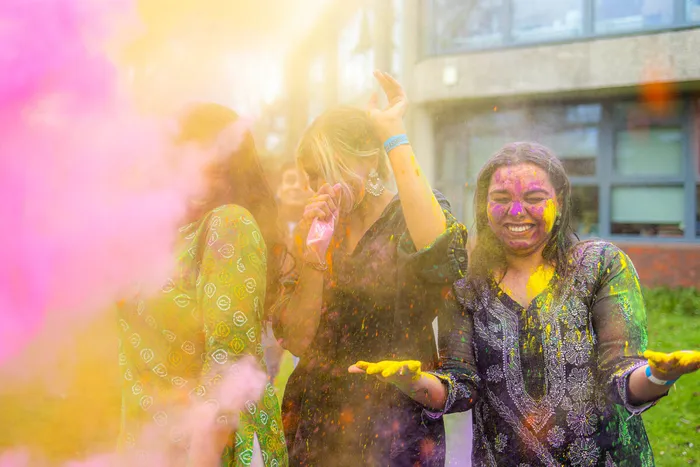 Students celebrating Holi