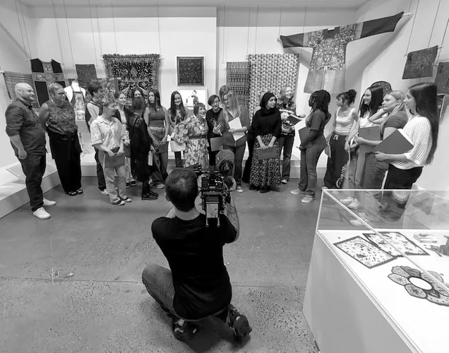 Zandra Rhodes surprising pupils at The London Fashion and Textiles Museum, for BBC's The One Show