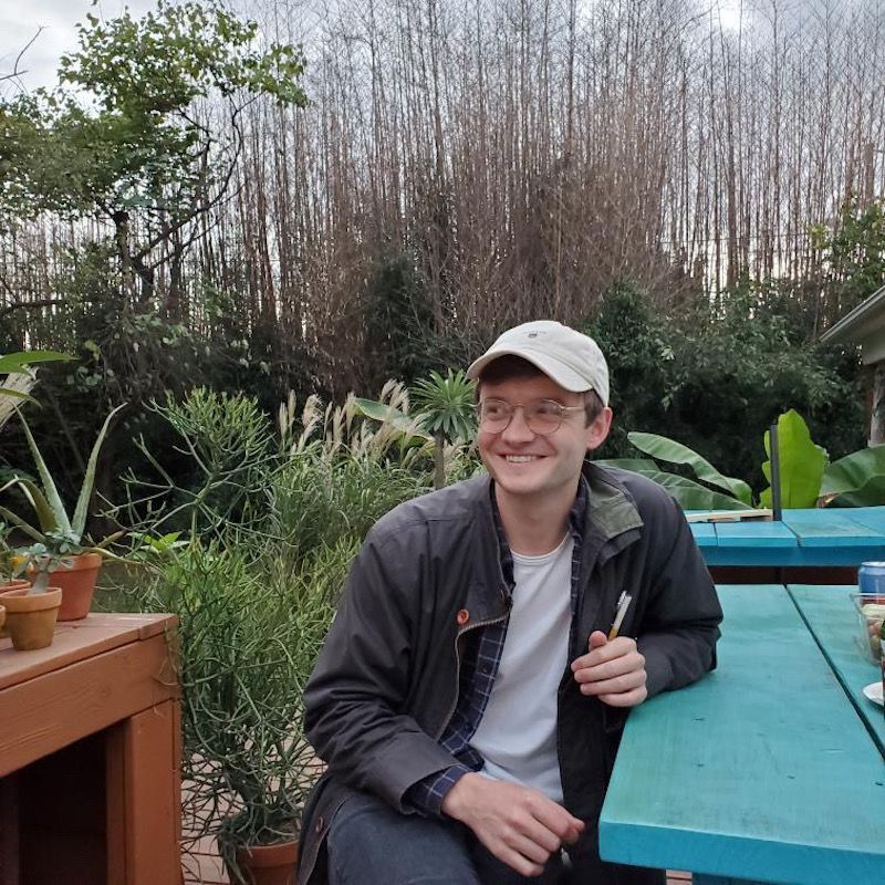 Ben Pearey sat at a bench