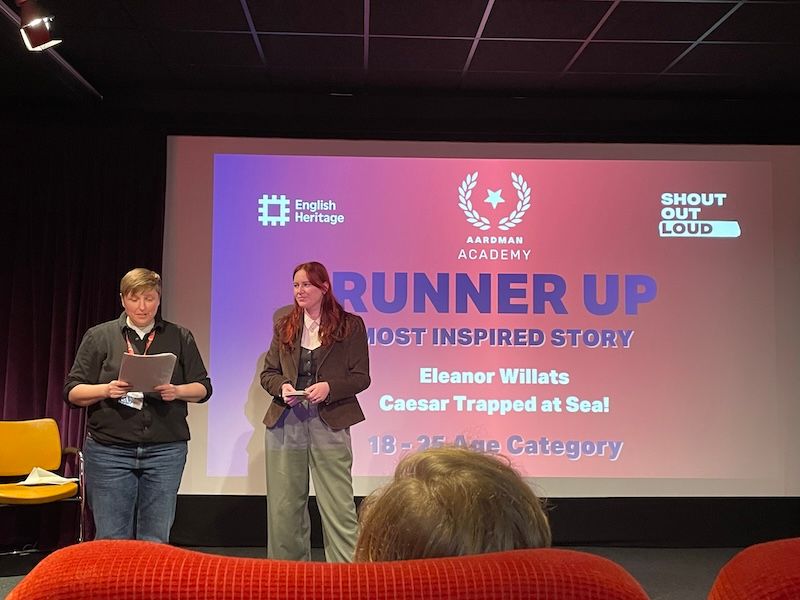 Elly Willats receiving her award at the Animated Histories Film Festival