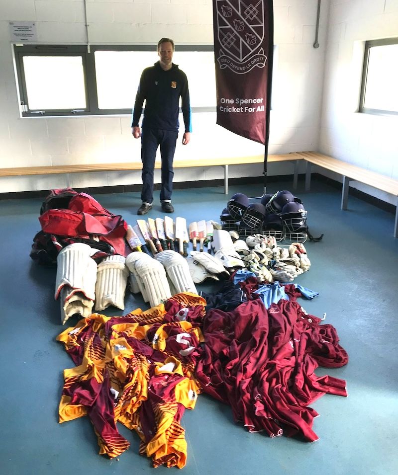 Jamie Greig, SCC Managing Director, with cricket gear donations